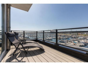 Bright modern apartment with large balconies, located directly on the marina